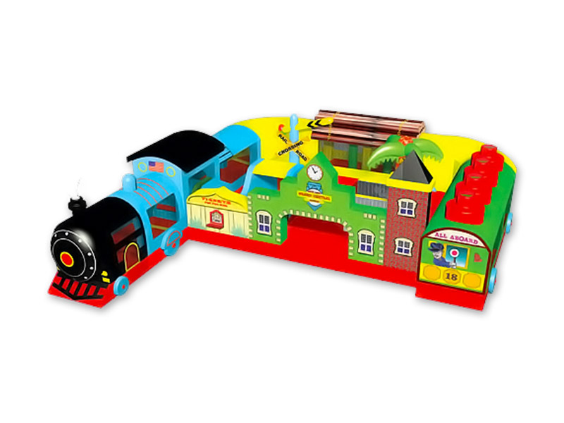 An inflatable blue train kids playground that features a large, colorful train engine with a black smokestack and wheels, a blue and yellow passenger car with windows, and a green and red caboose. The train is connected a train station playground.